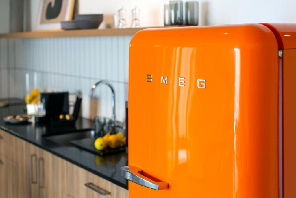 Kuchyň nebo kuchyňský kout v ubytování LIV URBAN Suites