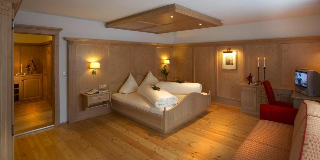 Posteľ alebo postele v izbe v ubytovaní Alpenhotel Ernberg