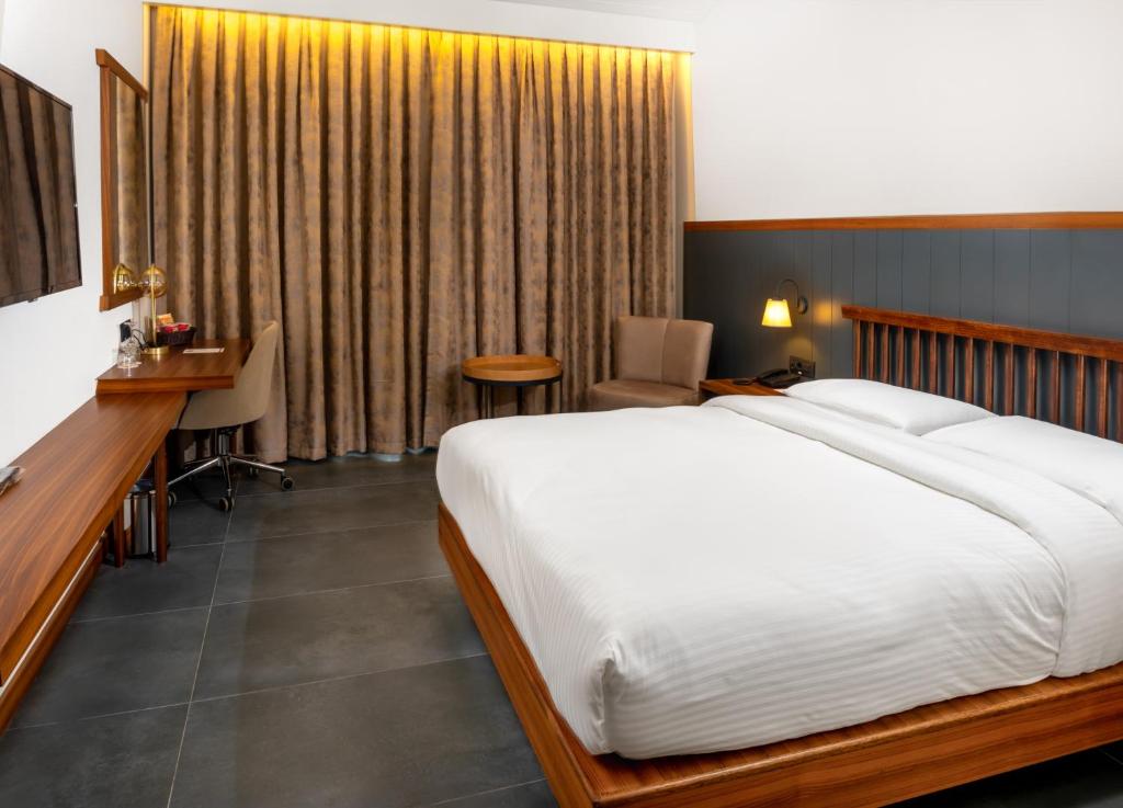 Postel nebo postele na pokoji v ubytování Anemon Kent Aydın Otel