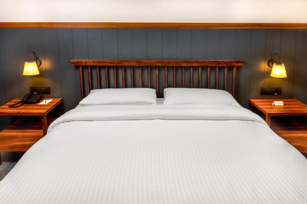 Postel nebo postele na pokoji v ubytování Anemon Kent Aydın Otel
