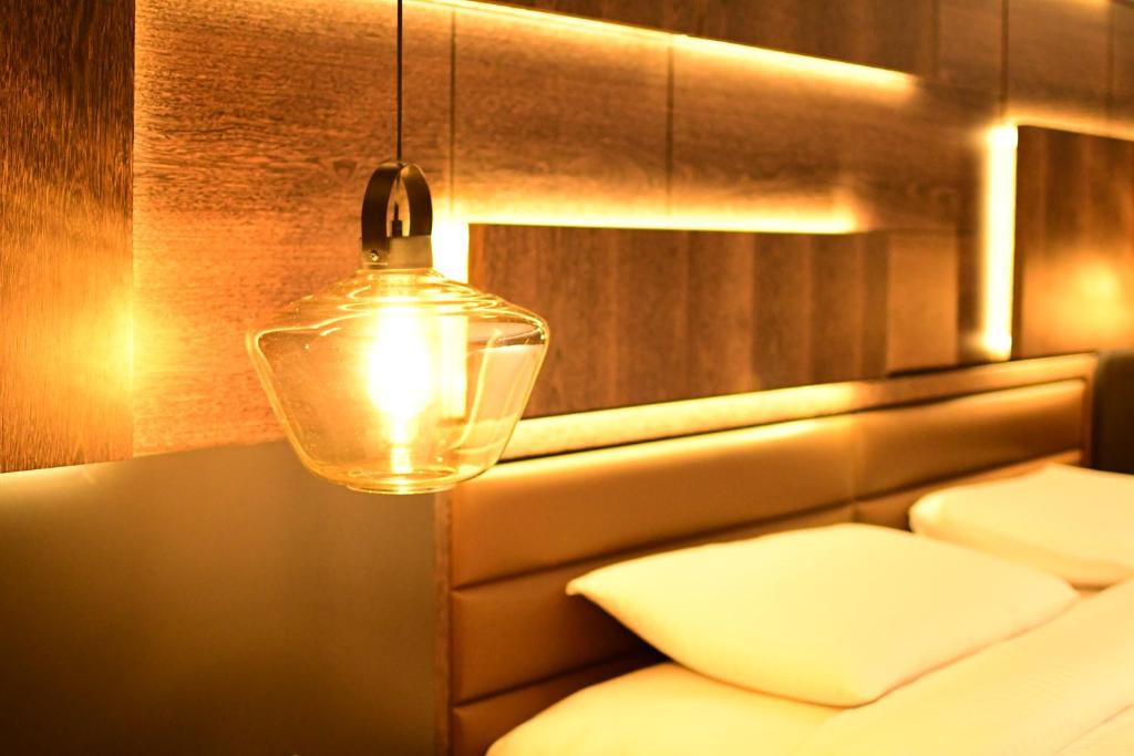 Postel nebo postele na pokoji v ubytování Anemon Kent Aydın Otel