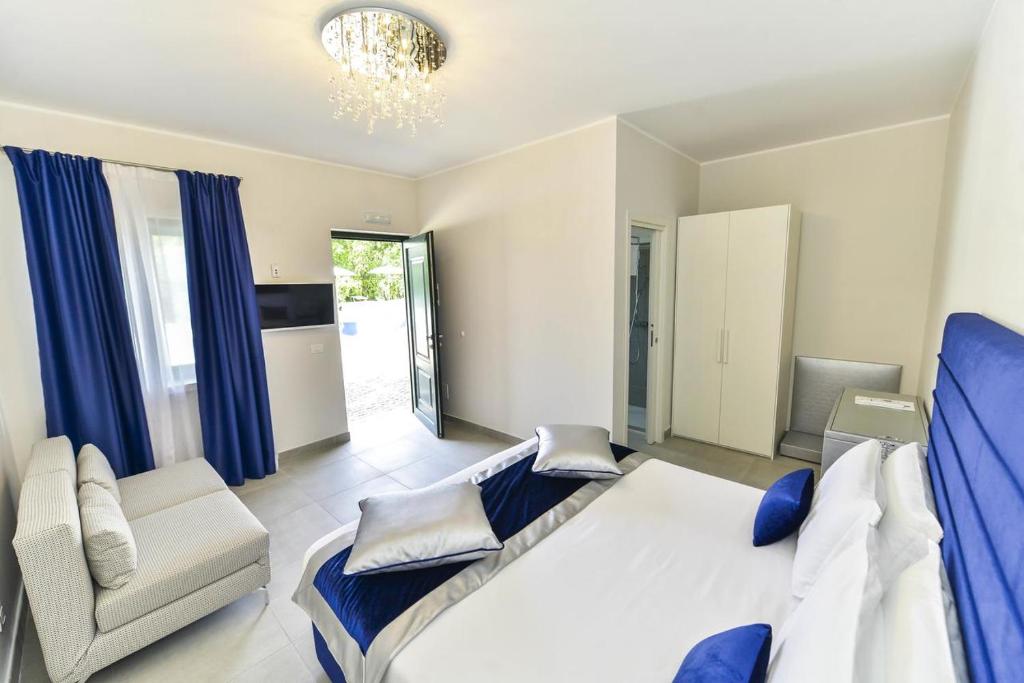 Postel nebo postele na pokoji v ubytování Agriturismo Borgo Imperiale