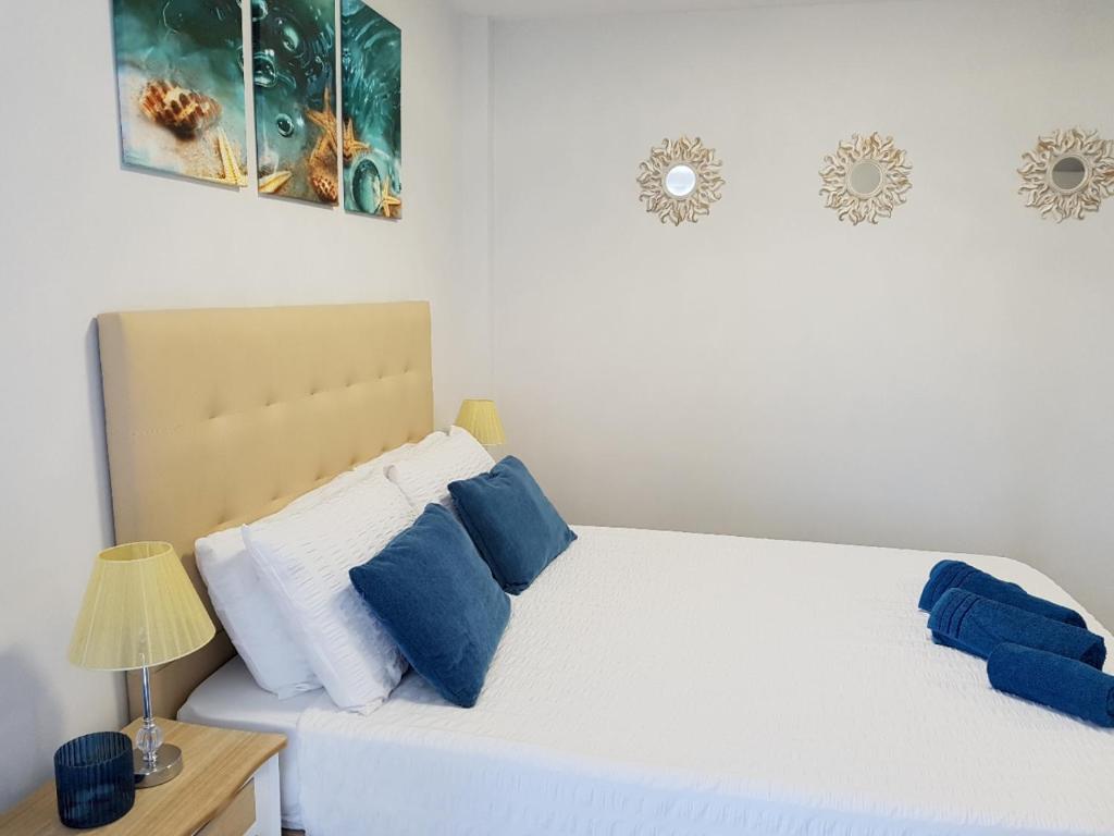 A bed or beds in a room at Rancho A 112