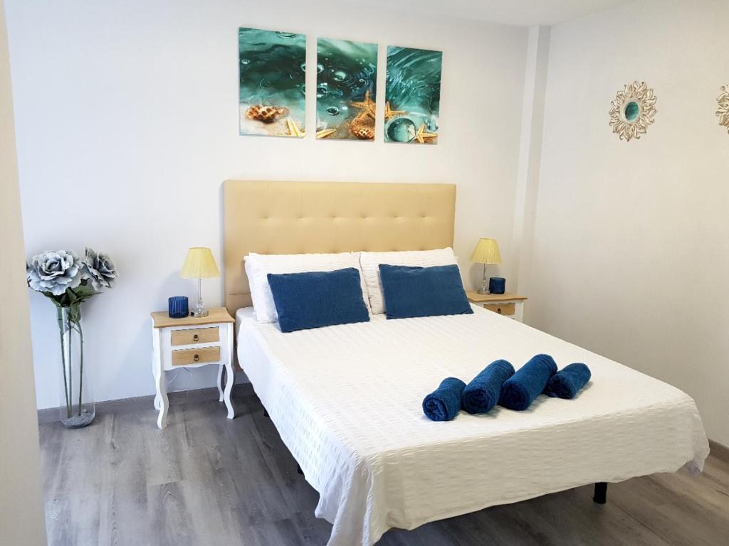 A bed or beds in a room at Rancho A 112