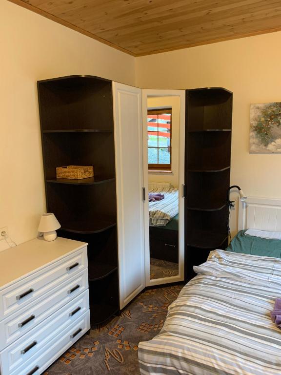 Postel nebo postele na pokoji v ubytování Penzion U Orla