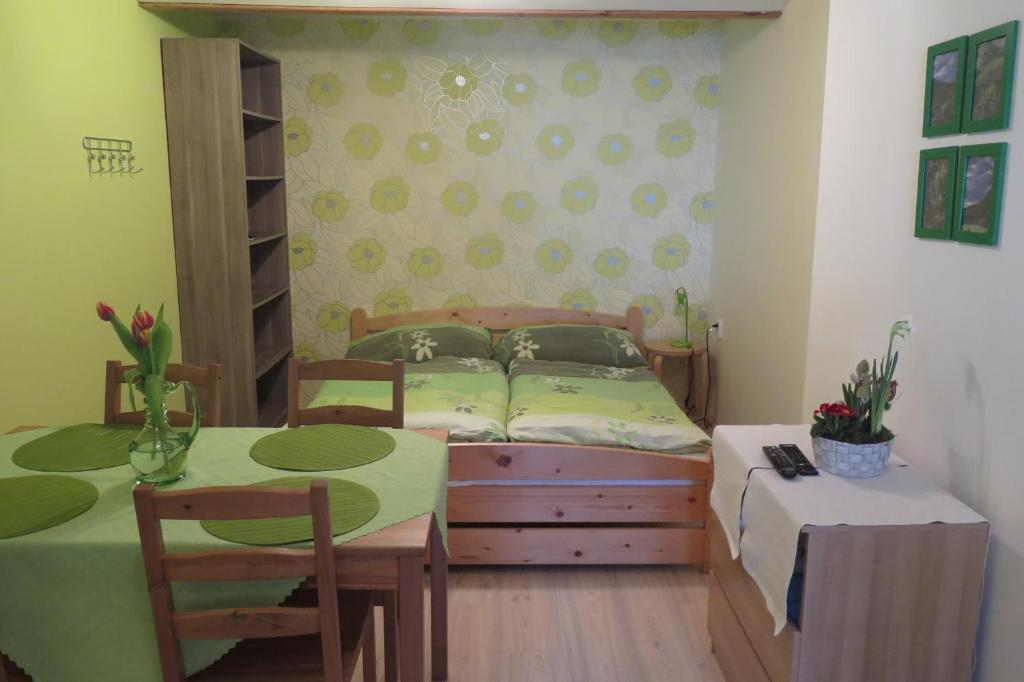 Postel nebo postele na pokoji v ubytování Apartments Skiareál U Vodárny Bedřichov