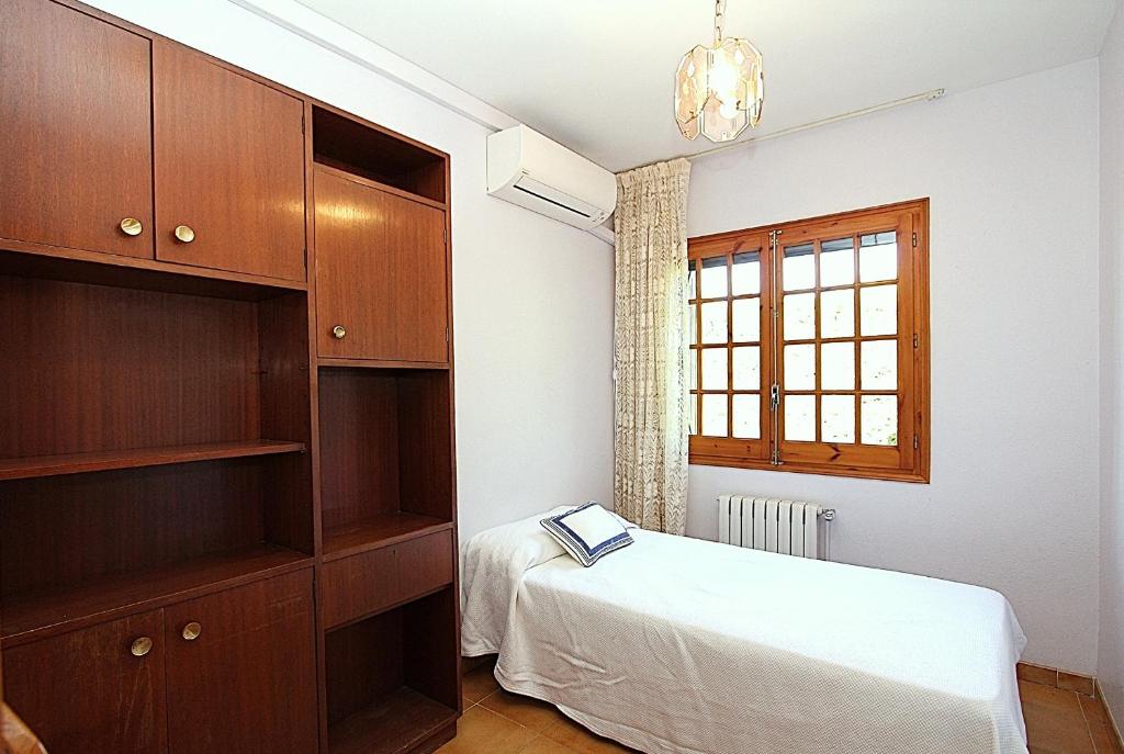 Postel nebo postele na pokoji v ubytování Villa Borghese