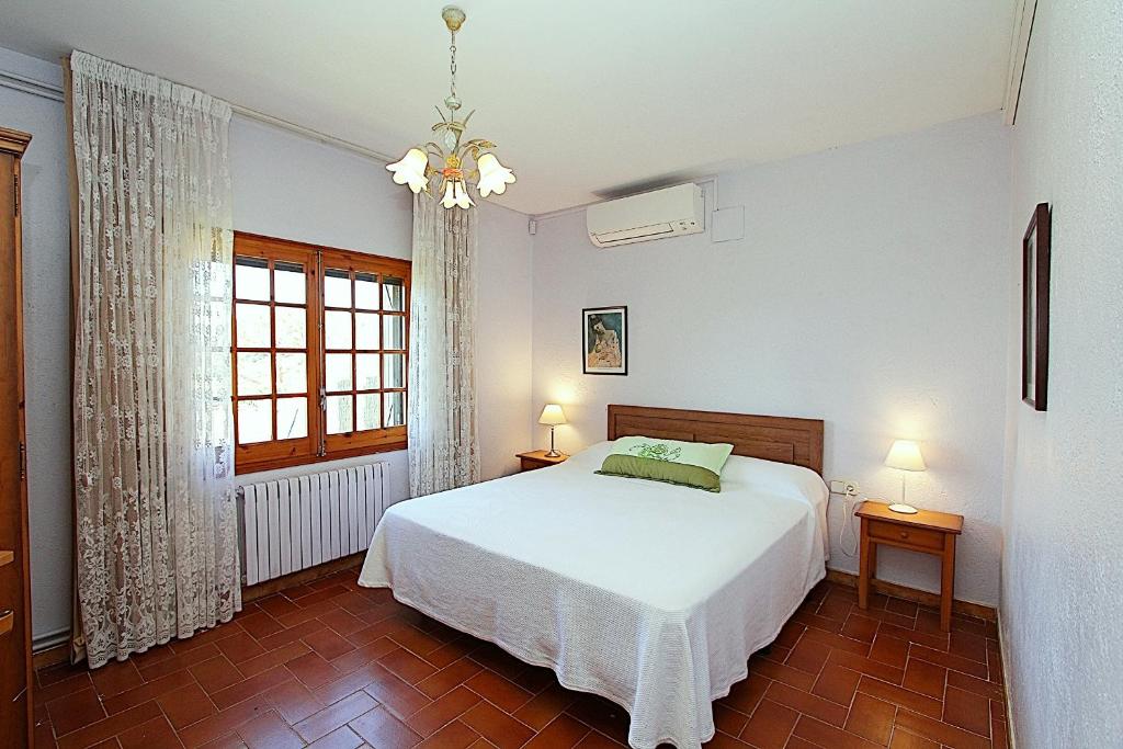 Postel nebo postele na pokoji v ubytování Villa Borghese