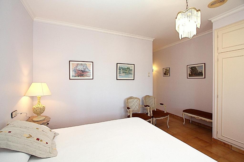 Postel nebo postele na pokoji v ubytování Villa Borghese