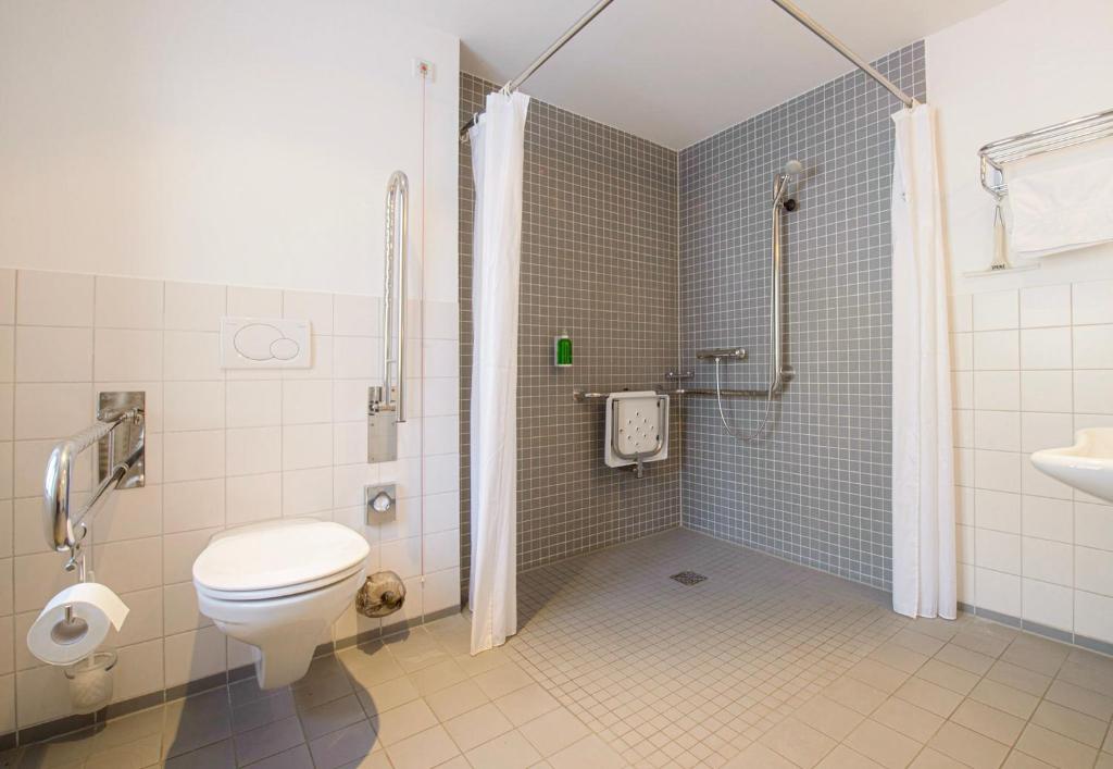 Koupelna v ubytování Hotel Am Tiefwarensee