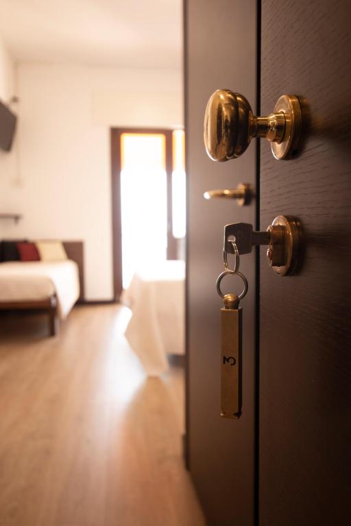 Postel nebo postele na pokoji v ubytování Hotel San Zeno