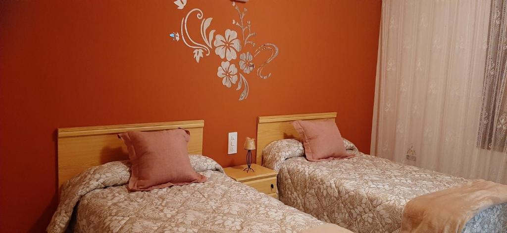Cama o camas de una habitación en Apartamentos rurales La posada de Donato