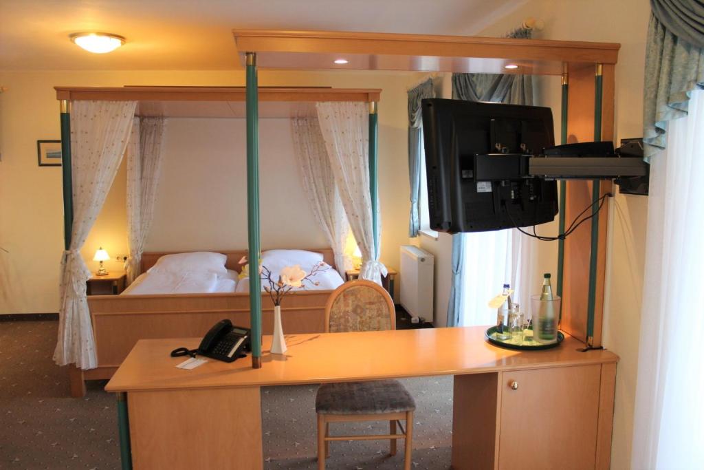 TV a/nebo společenská místnost v ubytování Hotel Wolfringmühle