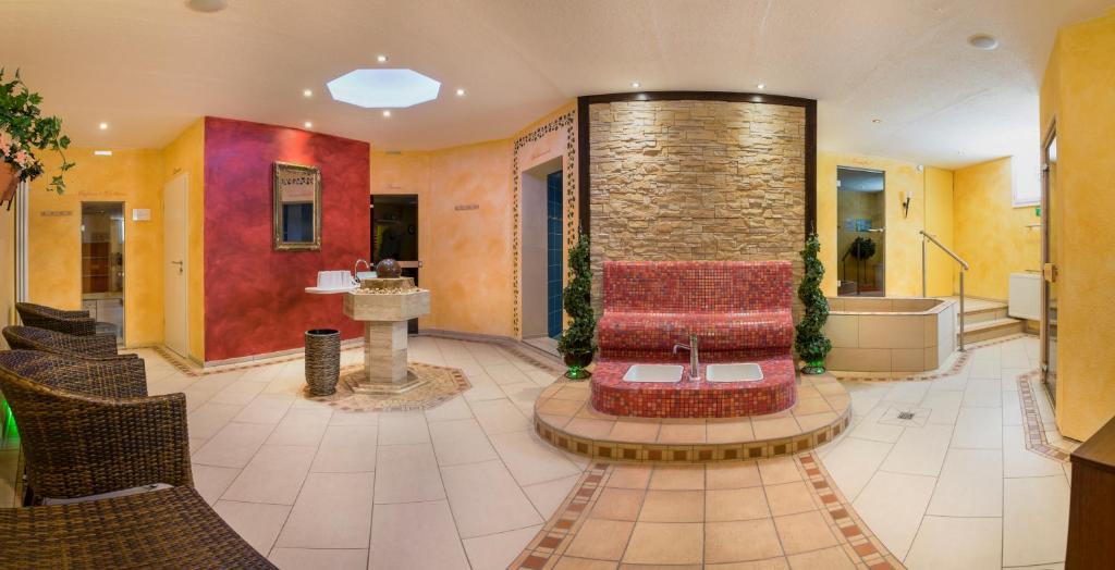 Posezení v ubytování Hotel Wolfringmühle