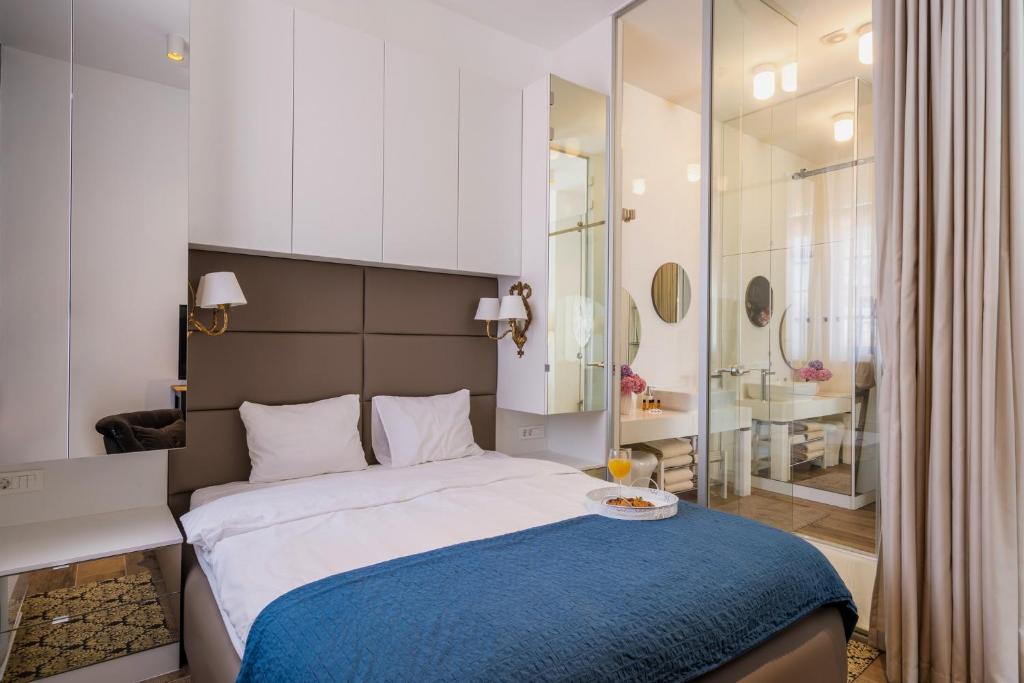 Postel nebo postele na pokoji v ubytování AH Design Apartments Deluxe