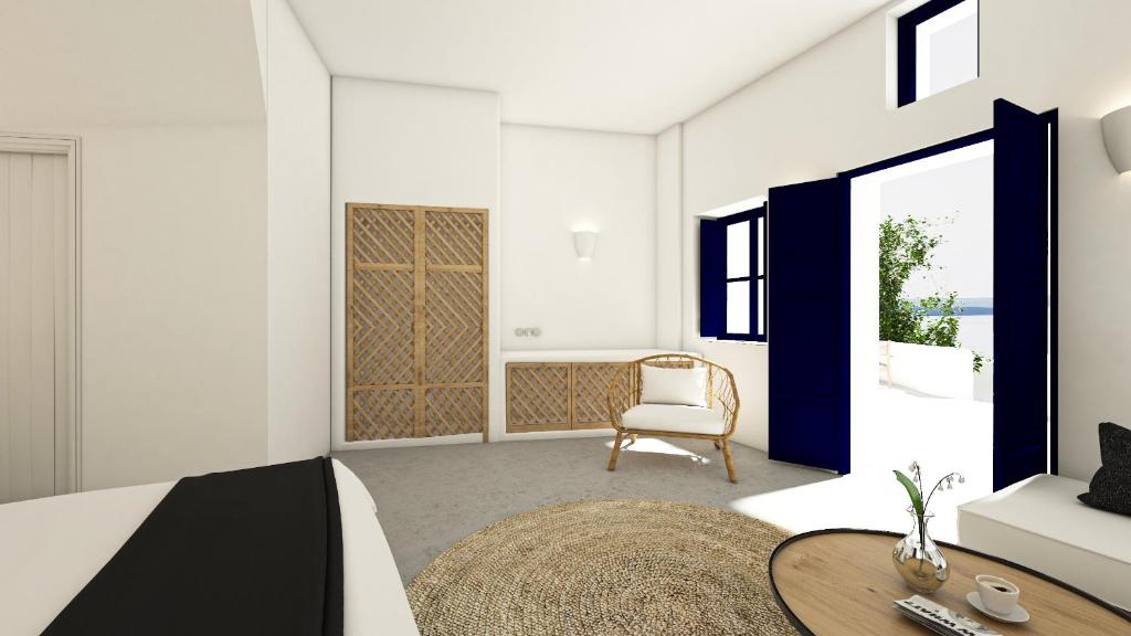 Postel nebo postele na pokoji v ubytování Oia Memories Suites