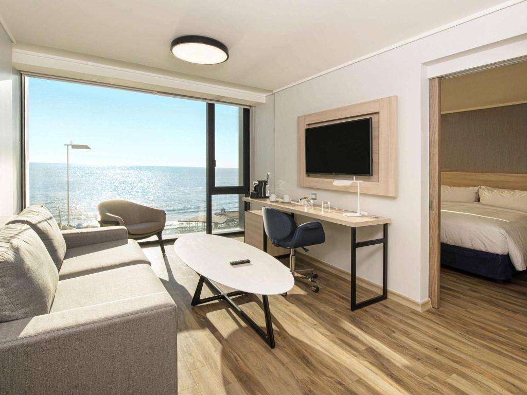 Cama o camas de una habitación en Pullman Vina del Mar San Martin