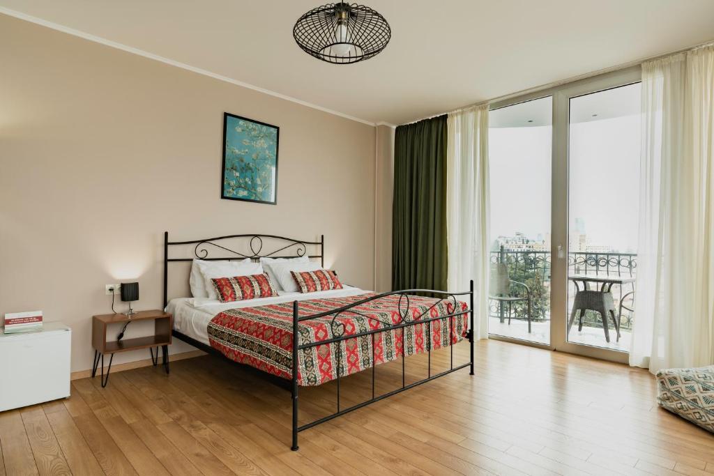 Postel nebo postele na pokoji v ubytování Hotel Flower