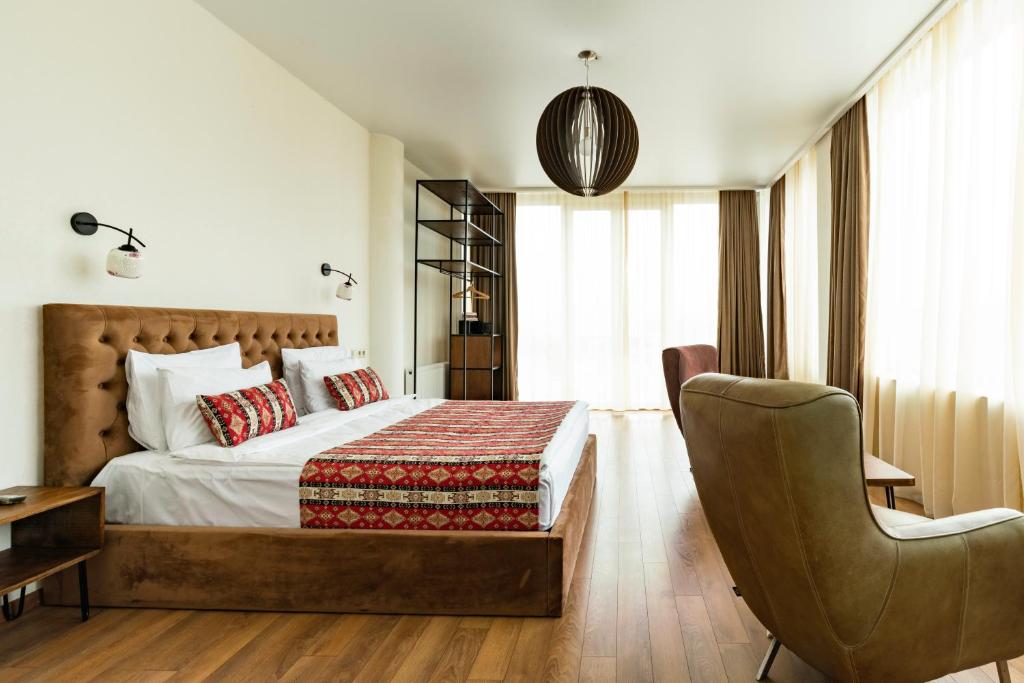 Postel nebo postele na pokoji v ubytování Hotel Flower