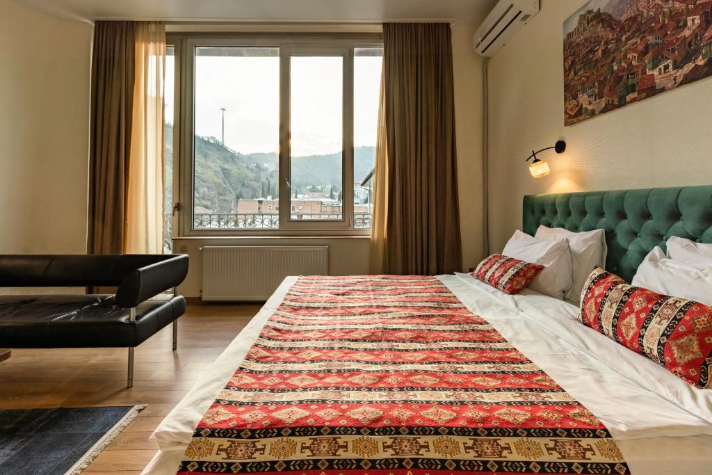 Postel nebo postele na pokoji v ubytování Hotel Flower