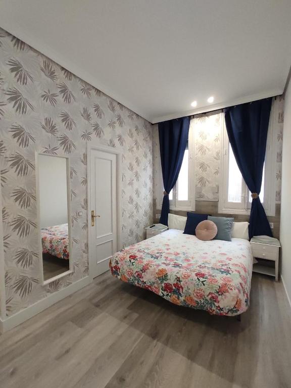 Postel nebo postele na pokoji v ubytování Hostal Alfaro