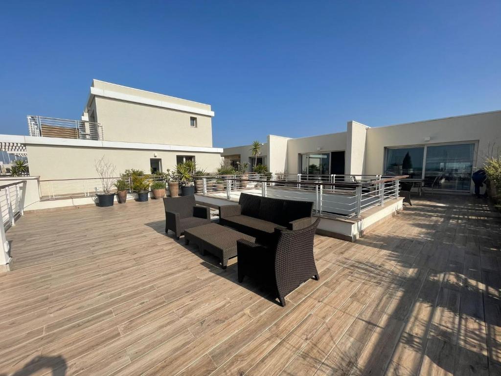 A balcony or terrace at Appartamenti Vacanze Marina di Scarlino