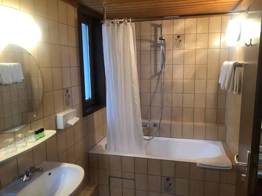 Koupelna v ubytování Hotel du Parc