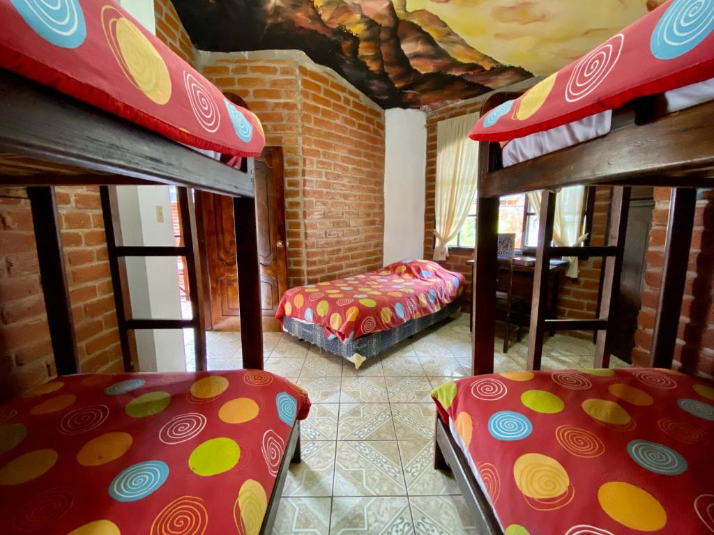 Postel nebo postele na pokoji v ubytování Great Hostels Backpackers