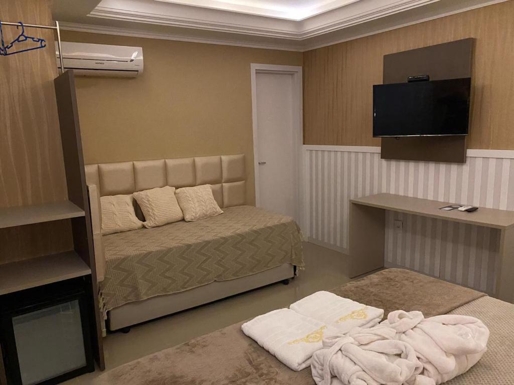 TV a/nebo společenská místnost v ubytování Pousada Bela By Bia