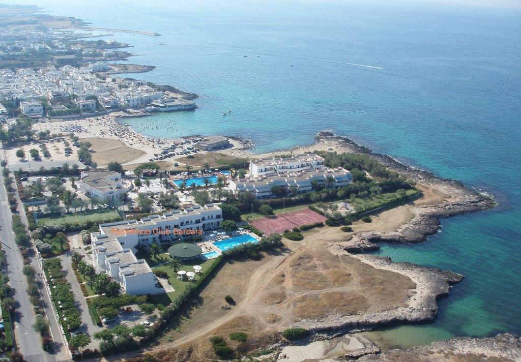 an aerial view of a resort next to the ocean at Residence Club Barbara in Ostuni