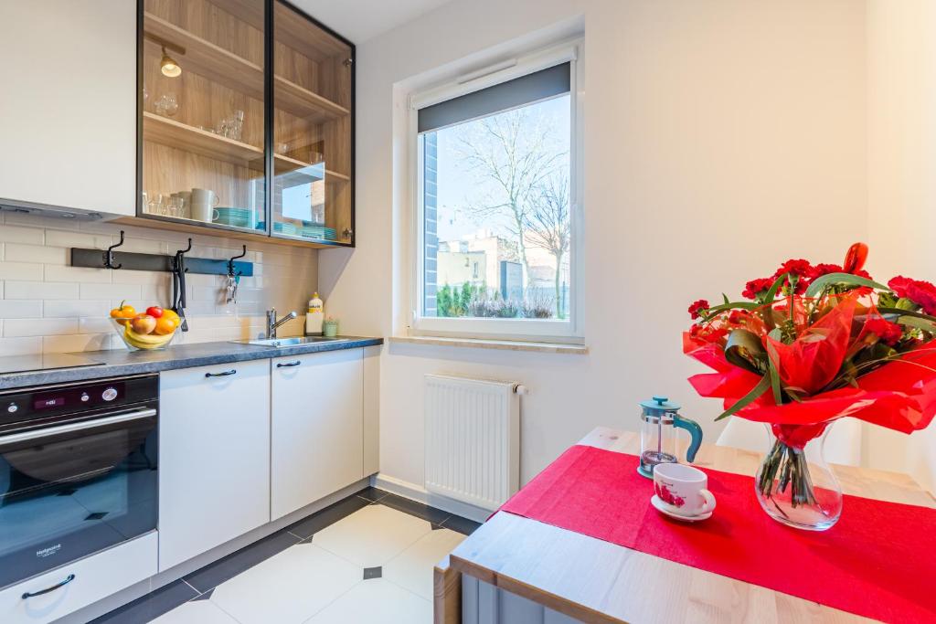 Kuchyňa alebo kuchynka v ubytovaní Grobla by Loft Apartments