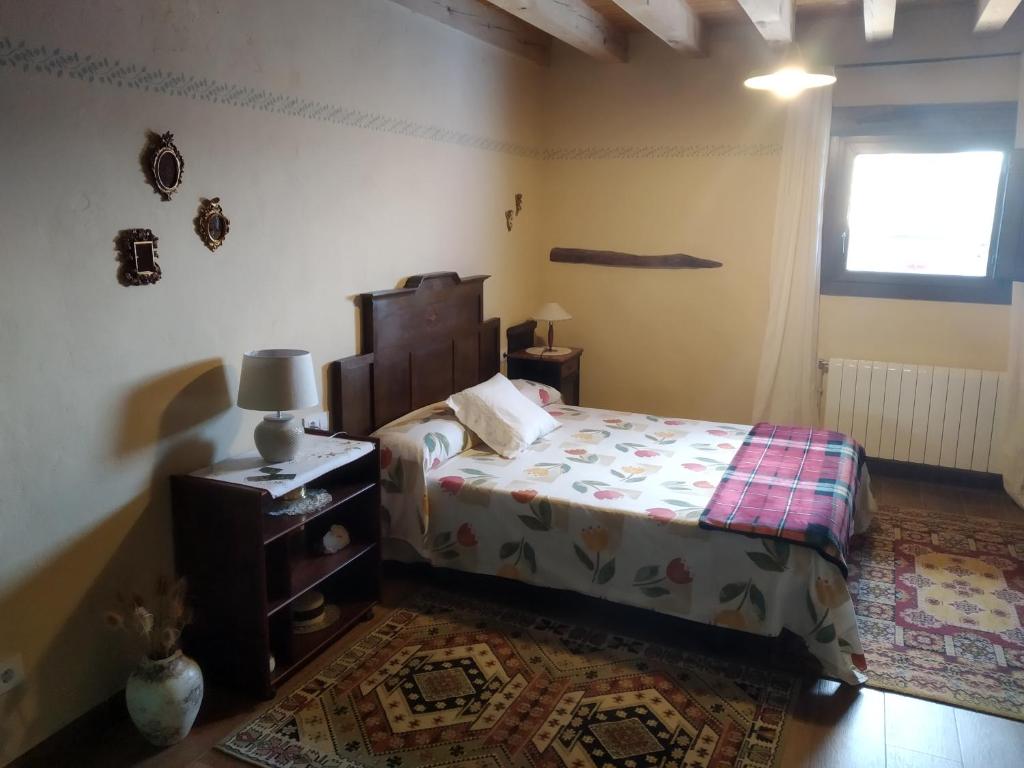 Postel nebo postele na pokoji v ubytování Ca la Cisca
