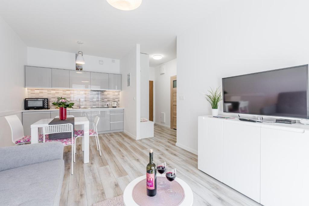 Kuchyňa alebo kuchynka v ubytovaní Grobla by Loft Apartments