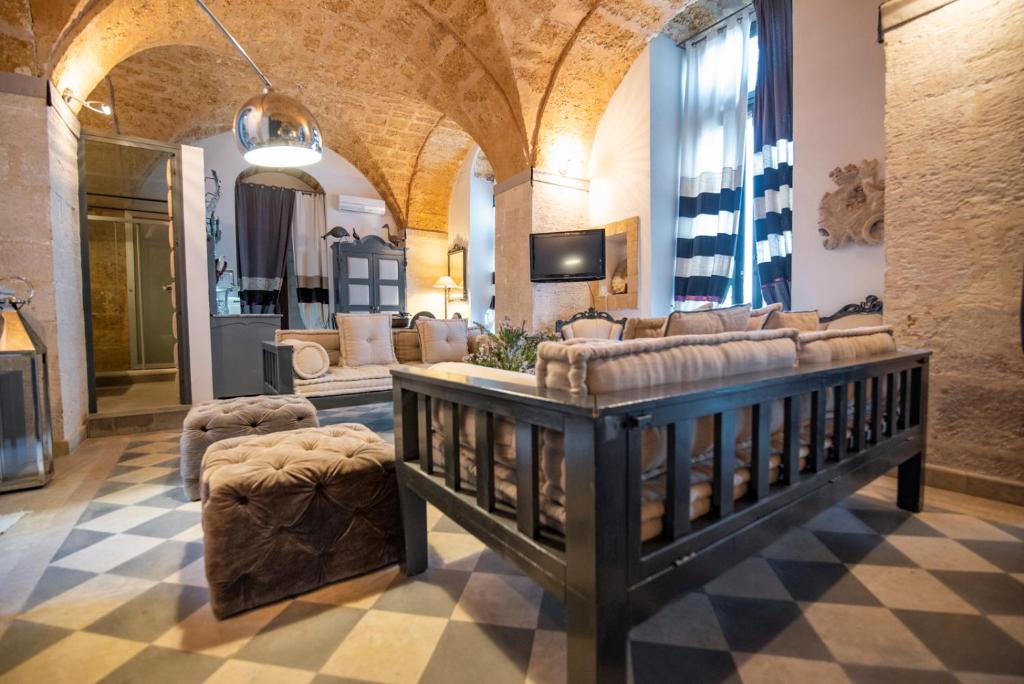 A seating area at Maniace Suites
