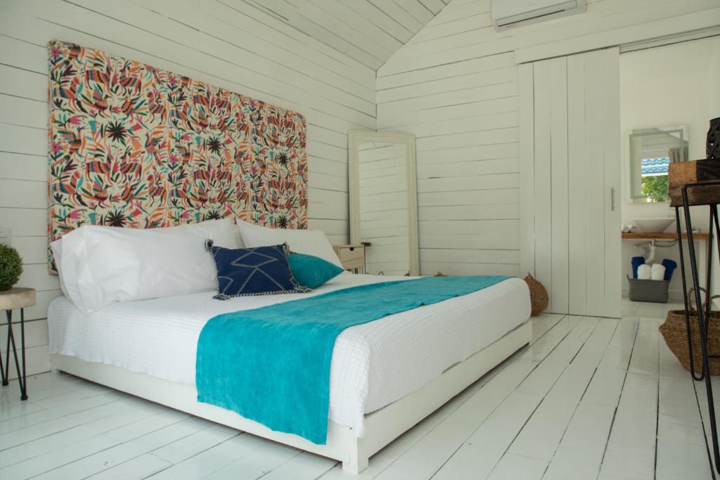 Postel nebo postele na pokoji v ubytování Zensus Eco Boutique Hotel