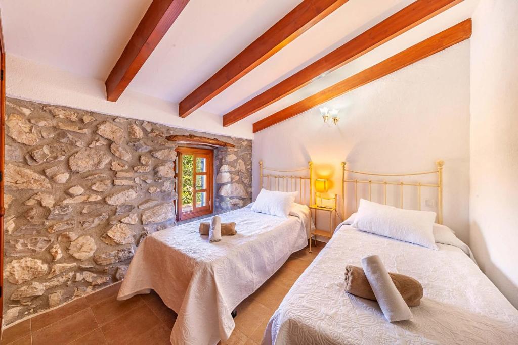 A bed or beds in a room at Villa Mala Garbo by Sealand Villas