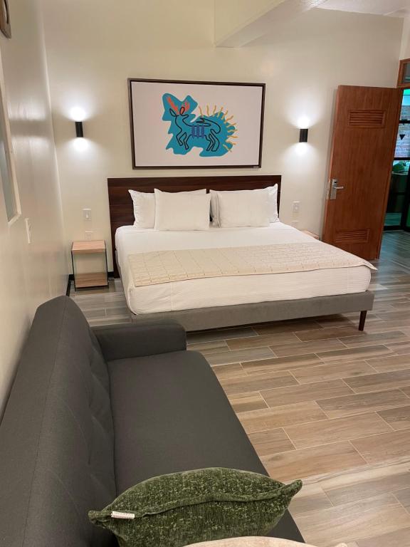 Postel nebo postele na pokoji v ubytování Joint Boutique Hotel