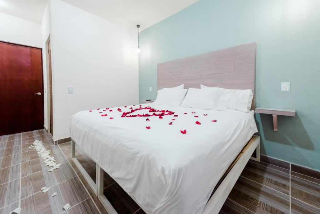 Postel nebo postele na pokoji v ubytování Hotel Hai Do