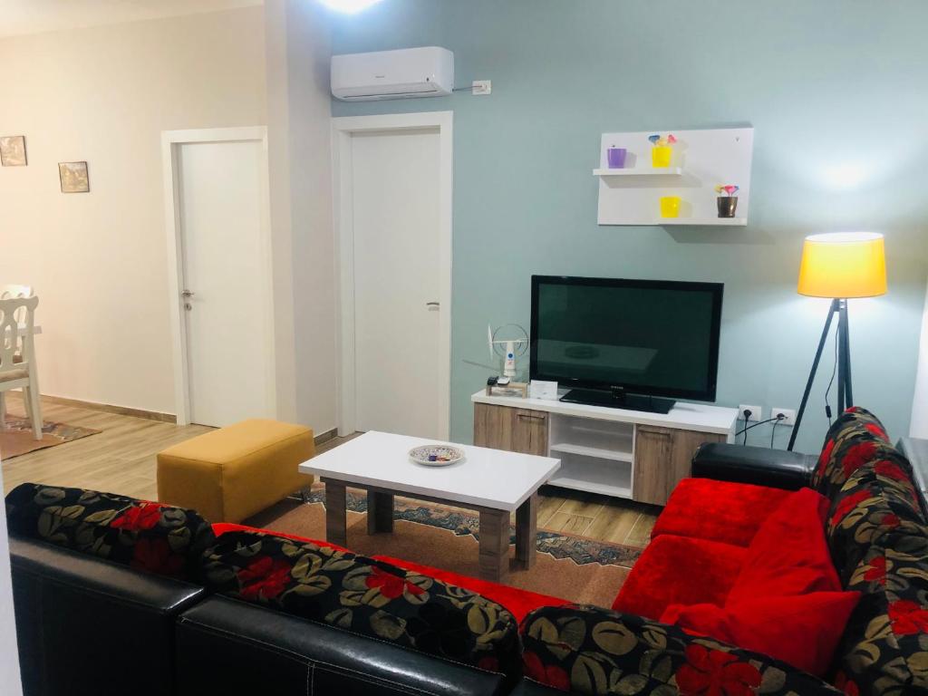 TV a/nebo společenská místnost v ubytování Rezidenca SHOPI Apartments
