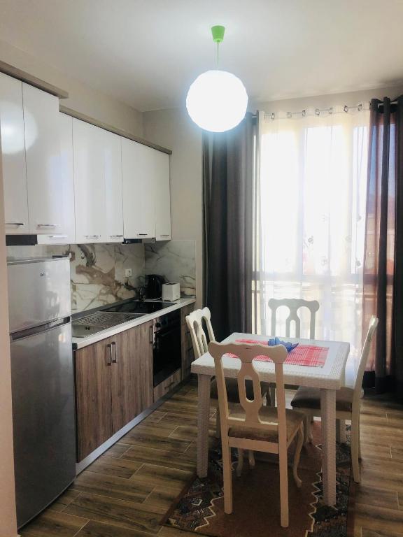 Kuchyň nebo kuchyňský kout v ubytování Rezidenca SHOPI Apartments