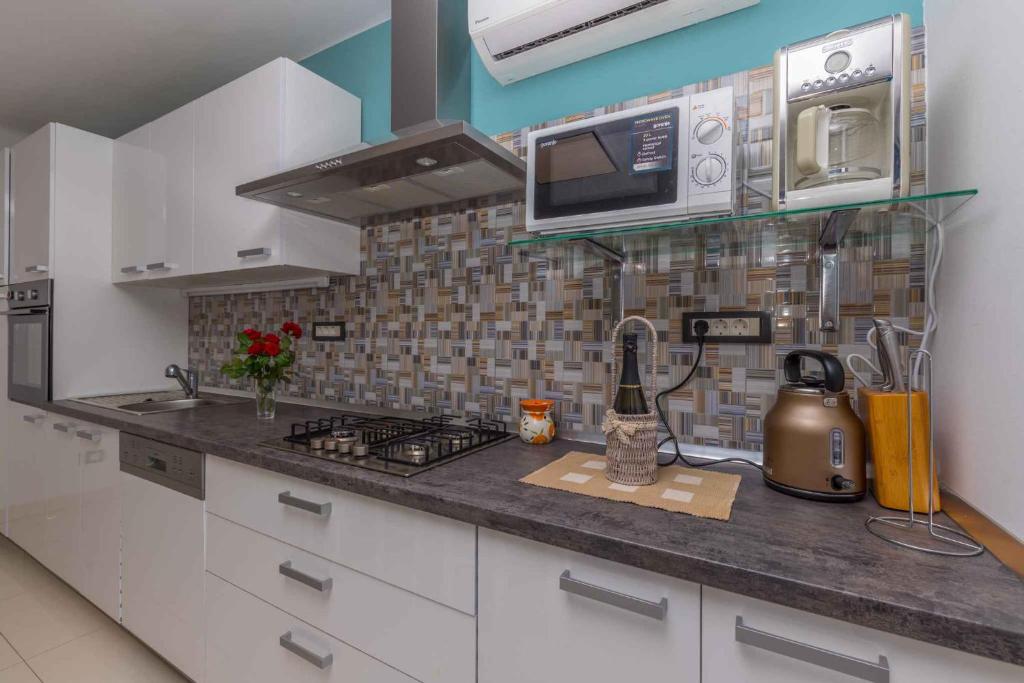 Kuchyň nebo kuchyňský kout v ubytování Holiday home in Crikvenica 41380
