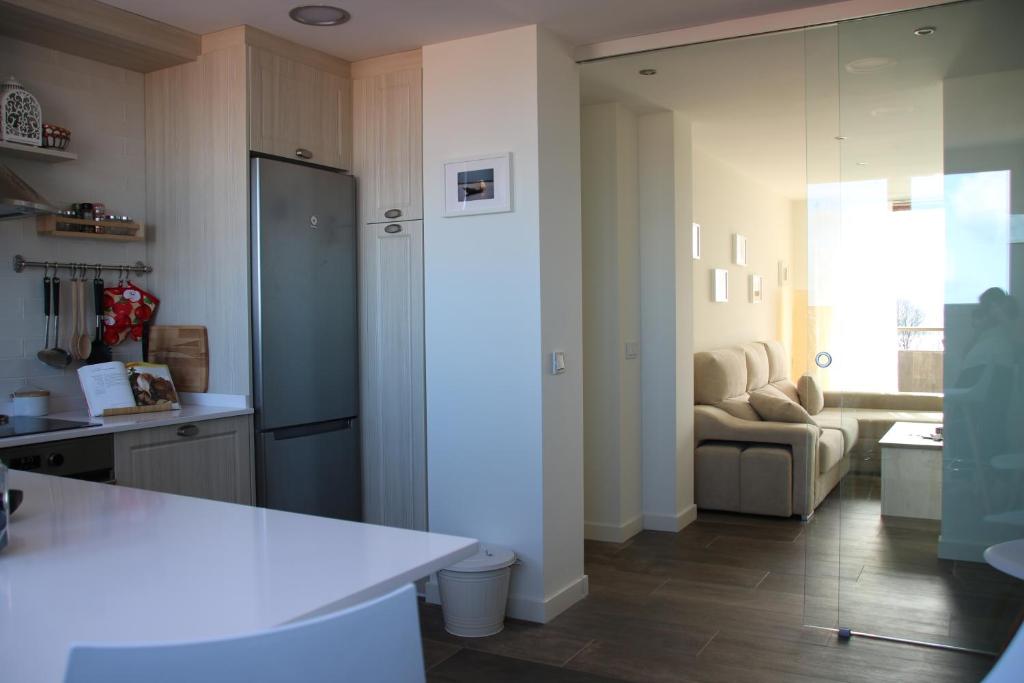 Kuchyň nebo kuchyňský kout v ubytování Precioso apartamento con magníficas vistas - Apartamento Aifos