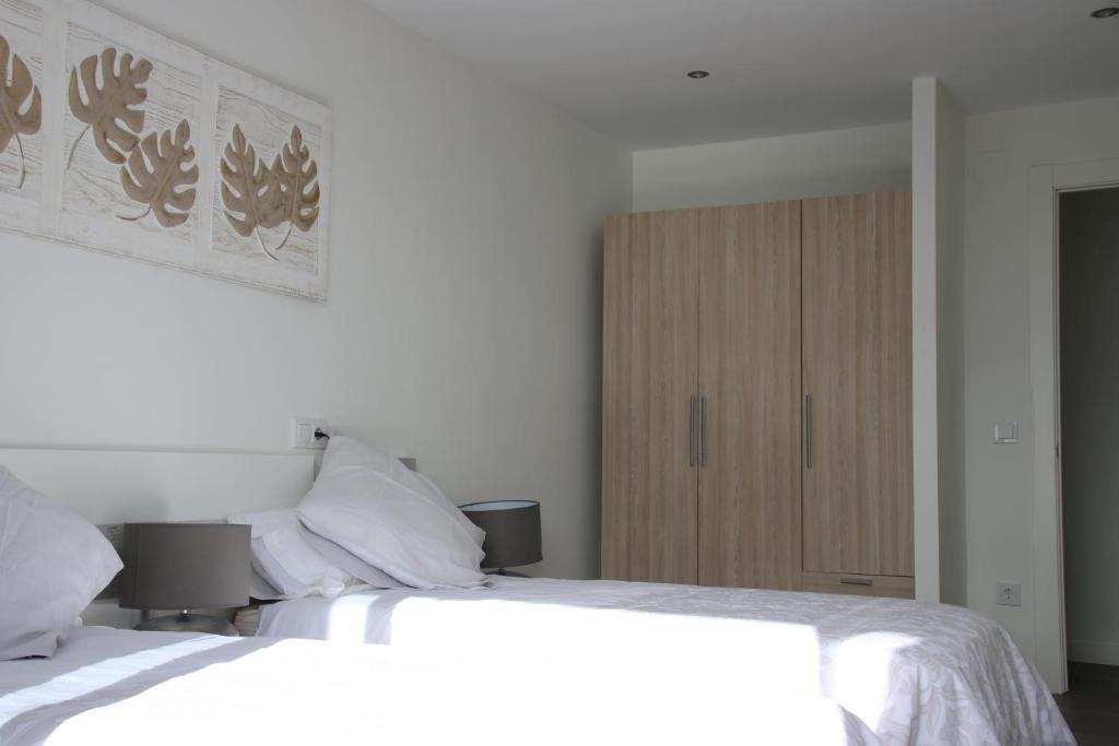 Postel nebo postele na pokoji v ubytování Precioso apartamento con magníficas vistas - Apartamento Aifos
