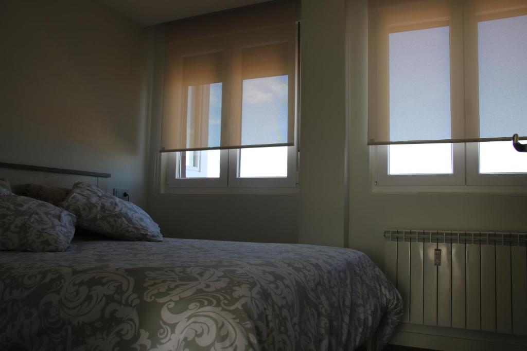 Postel nebo postele na pokoji v ubytování Precioso apartamento con magníficas vistas - Apartamento Aifos