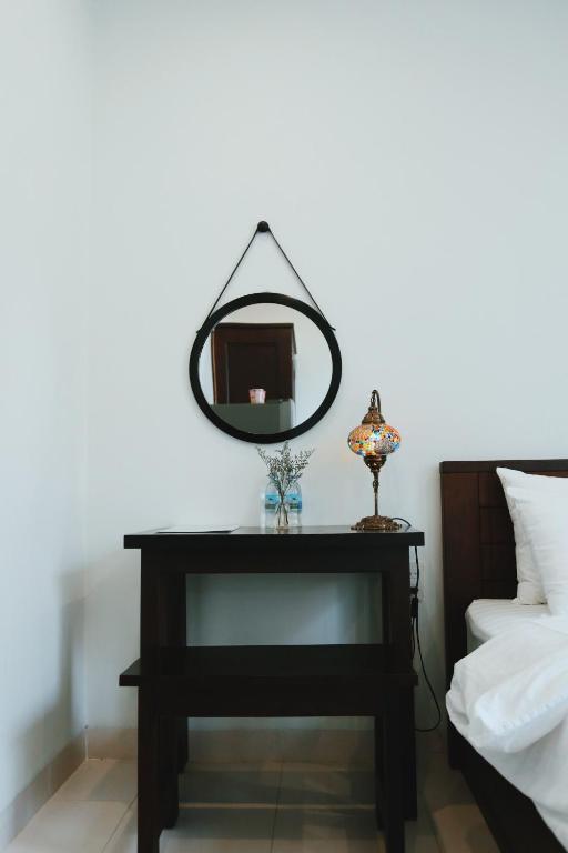 Giường trong phòng chung tại Moonlight House & Apartment Nha Trang