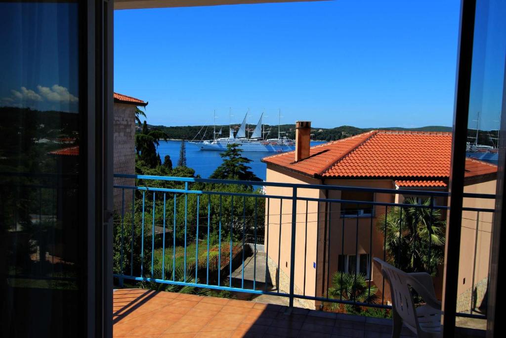 a view of a balcony with a view of a marina at Apartment Monika in Rovinj