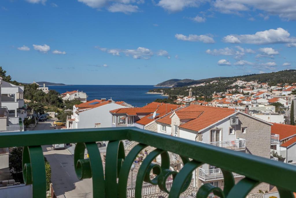 a view of a city from a balcony at Apartments Marija Bibić in Hvar