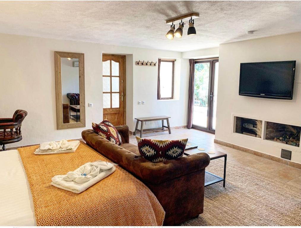 Televízia a/alebo spoločenská miestnosť v ubytovaní Jardines De La Reina Boutique Bed & Breakfast