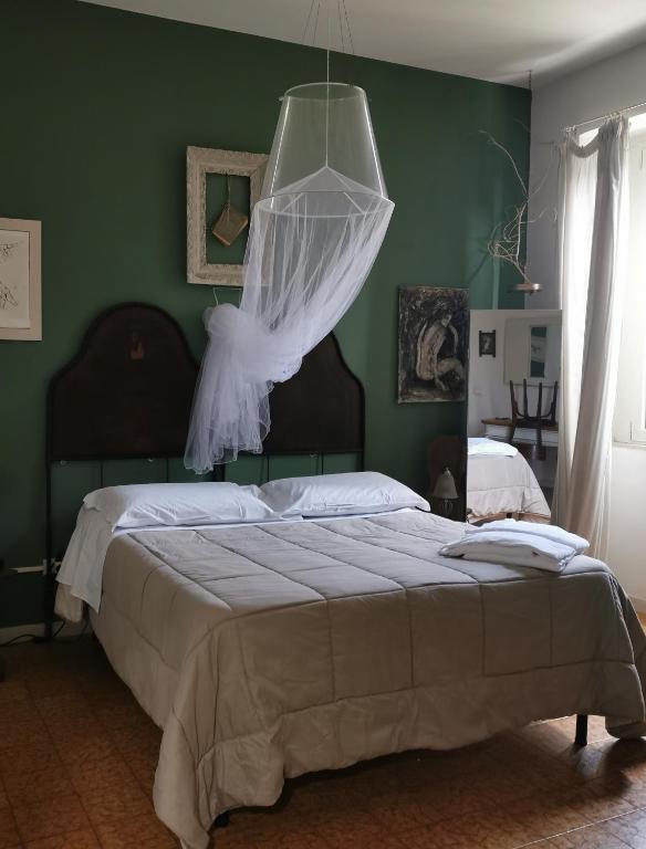 A bed or beds in a room at B&B LaMaGia di Corte Moronati