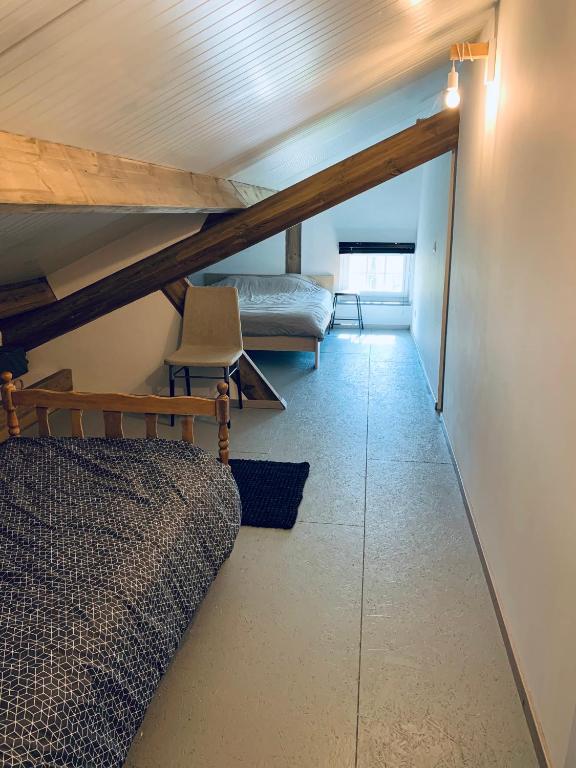 Postel nebo postele na pokoji v ubytování MMGhome - Gîte à la ferme